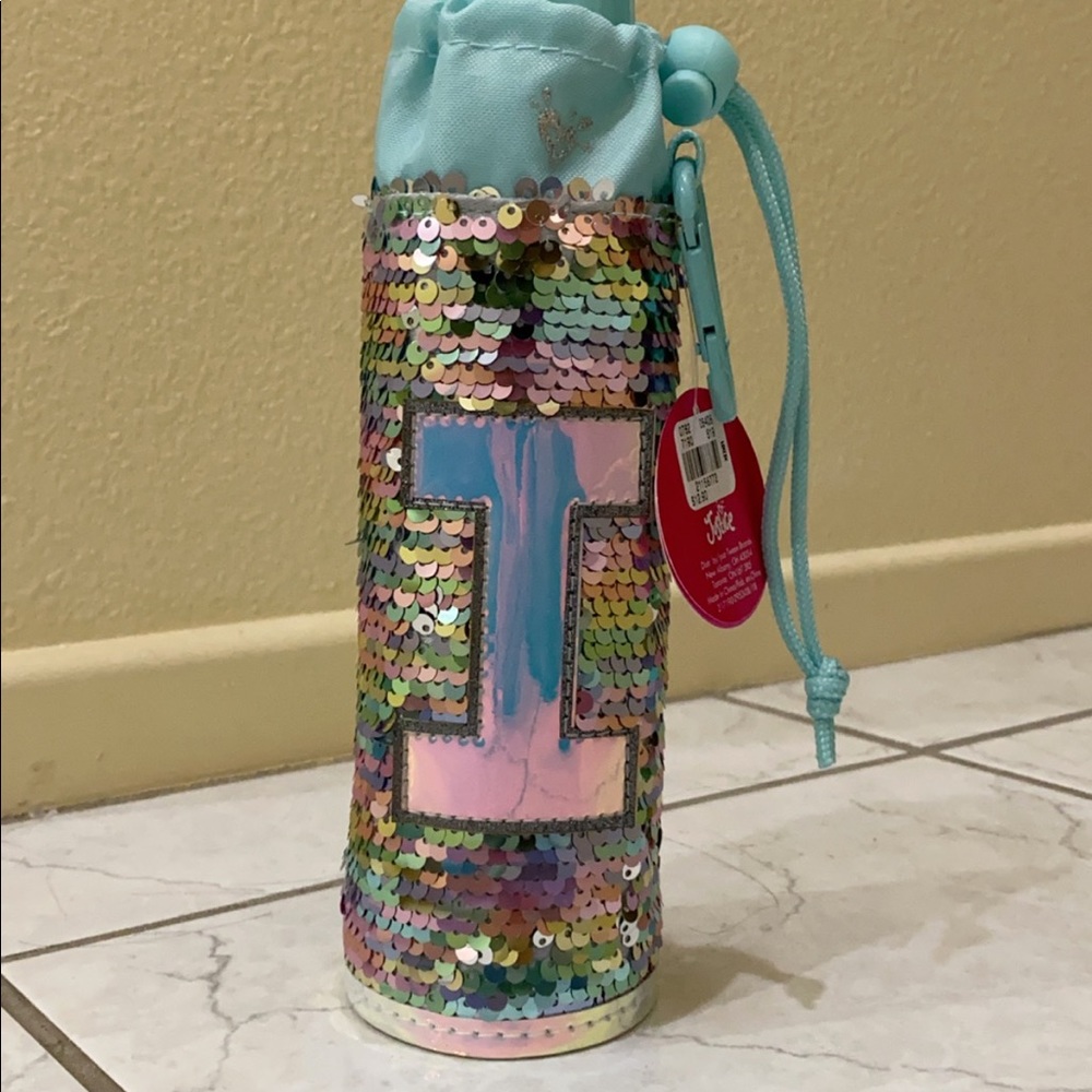 water bottle with initial, letter “I”